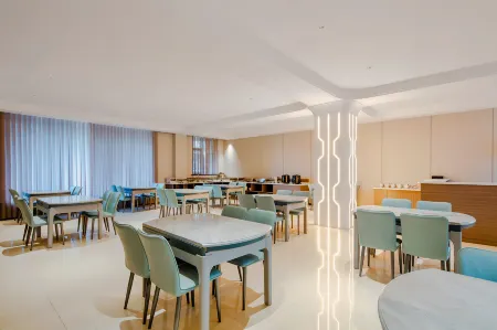 Yimei Tianxu Light Luxury Smart Enjoy Hotel (Jinzhong Taigu Station) Отели рядом со станцией Taigu West Railway Station