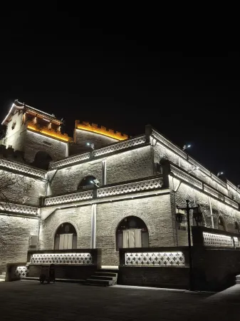 Huameishi Hot Spring Hotel (Xinzhou Ancient City Store Отели рядом с достопримечательностью «Xiurong College»