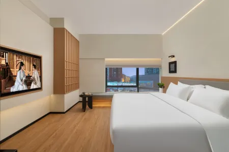 Xingwang Designer Hotel (Chongqing Yangjiaping Pedestrian Street Branch) Отели рядом с достопримечательностью «Chongqingligong University»
