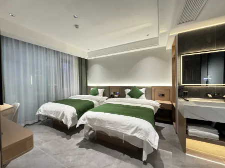 Huayue Hotel Отели рядом с достопримечательностью «Народная больница Децзян»