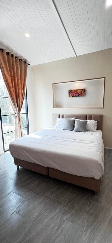 รูปภาพของบ้านต้นลมสุวรรณภูมิ