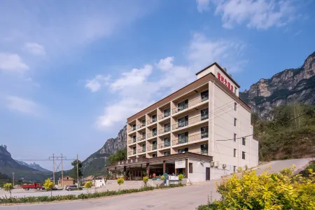 Slow Time Hotel Отели в г. Хугуань