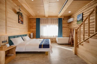 Baihaba Koala Boutique Homestay Hotels near Kanas Scenic Area Baihaba Tourist Sightseeing Horse Team