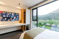 Tranquil Creekside Forest Inn Hotel a Yueqing