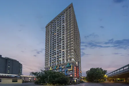 Orange Hotel (Shanghai Jinshajiang Road Metro Station) Отели рядом с достопримечательностью «Чжуншань Парк»