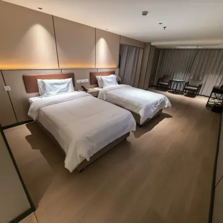 Ai Fei Hotel (Shanghai Baoan Highway Subway Station Shuichan West Road Branch) Отели рядом с достопримечательностью «Шанхай коммуникейшенс Политекник»
