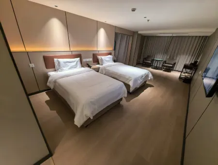 Ai Fei Hotel (Shanghai Baoan Highway Subway Station Shuichan West Road Branch) Отели рядом с достопримечательностью «Shanghai Jiguang Polytechnic College»