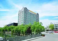 ZheShang ShiMao Yulong Hotel Отели в г. Хайнинг