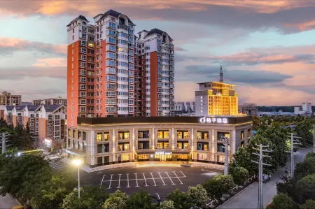 Orange Hotel Отели в г. Сяи