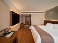 喆啡酒店（信陽息縣一橋龍湖店） 鄰近榮譽新世界購物中心的酒店