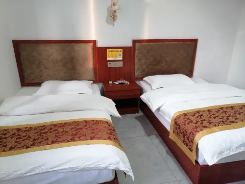 Xinlong Hotel - Inns