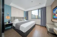 Shengmei Elegant Hotel (Longgang Nanlian Subway Station) Hotel in zona Luoruihe Food Pedestrian Street