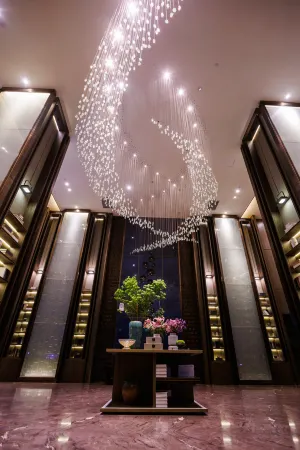 Ai Pai International Hotel, Shihezi Отели рядом с достопримечательностью «China Jade Garden»