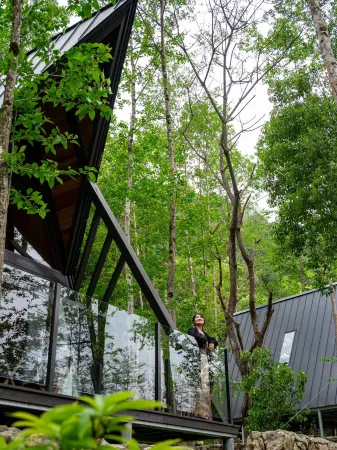 Jilan Manxin Valley Hidden World Holiday Homestay Отели в г. Гуйдун