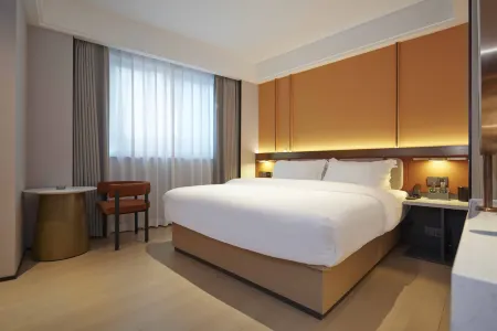 Meizhu Yuexiong Hotel (Liuzhou Ma'anshan Park Branch) Отели рядом с достопримечательностью «Guangxi Science and Technology University (Southwest to Liuzhou Qiaoyuan Unit)»