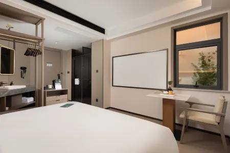 MEETADO Hotel Jiaxing Отели рядом с достопримечательностью «Xiuzhou Park»