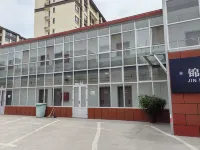 Xinjinlong Holiday Hotel (Linzhou Avenue Bus Station)