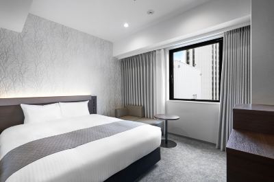 スタンダードダブルルーム(禁煙) ダイワロイネットホテル札幌中島公園の写真