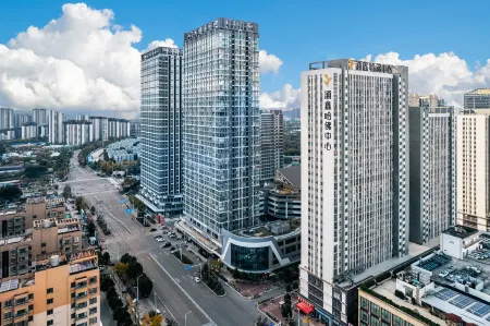 Yipin Hotel (Kunming South Railway Station Chenggong University Town) Отели рядом с достопримечательностью «Yunnan Minzu University (Yuhua Campus)»