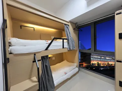 Three Cats Youth Hostel (Shenzhen Xixiang Metro Station Branch) Hotel a 