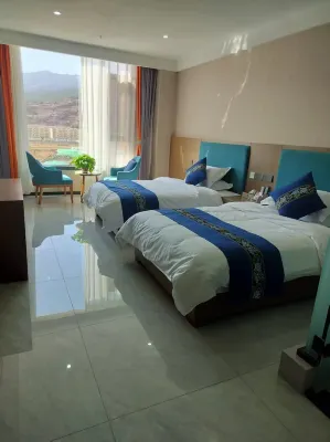 Xide Jinsuoma Grand Hotel