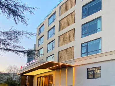 Meihao R Hotel (Qingdao Zhanqiao Railway Station Branch) Hotel in zona Ping'an Clippers Terminal (Xilingxia Road)