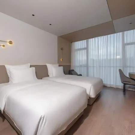 Novotel Kunshan East Отели в г. Куньшань