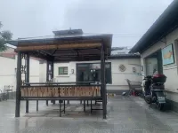 Xiong Xiongzhouzhen Manwoniu Homestay