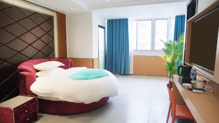 An yue juxin building business hotel Отели рядом с достопримечательностью «Anyue Stone Carvings»