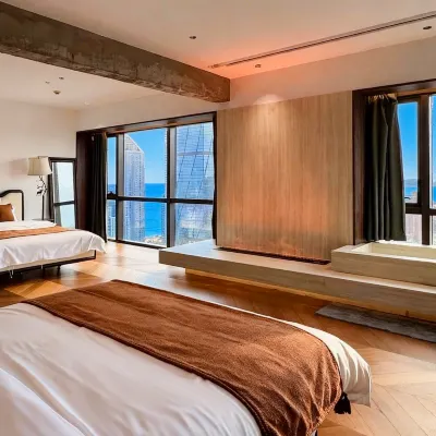 Qingdao HuanXi Apartment Hotel โรงแรมใกล้ห้างสรรพสินค้า MIXC