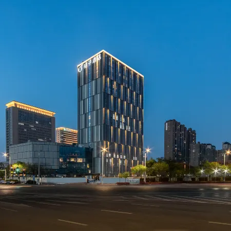 Orange Hotel (Zhengzhou East Railway Station Sports Center Subway Station) Отели рядом с достопримечательностью «Школа Чуньхуа, Новый район, Цуэндун»