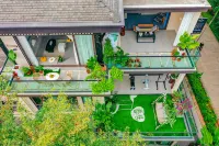 Xishuangbanna Jinghong Muju Boutique Homestay Hoteles en Wanda International Vacation Resort