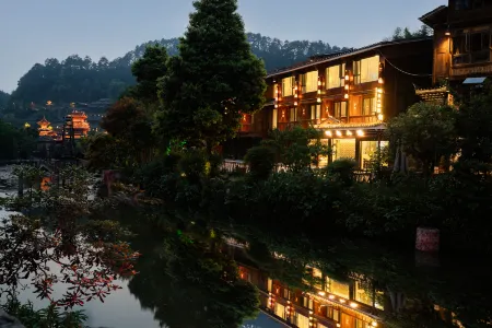 Story Mountain Wind Holiday Bed and Breakfast Отели рядом с достопримечательностью «Zhaoxing Dong Village»