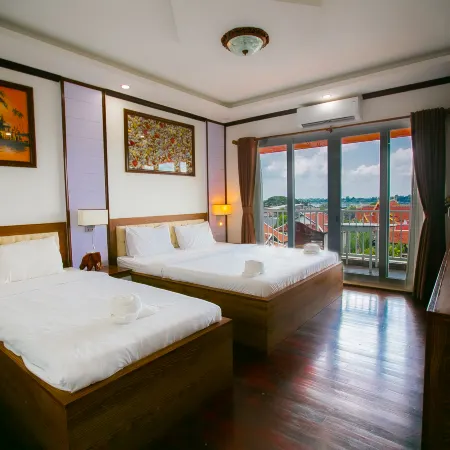 Vientiane Ruby Riverside Hotel & Hostel Отели рядом с достопримечательностью «Ват Чан»