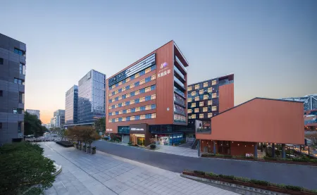 Tiangang Manfei Hotel (Ningbo Southern Business District Luomeng Universal City Store) Отели рядом с достопримечательностью «University Park Library»
