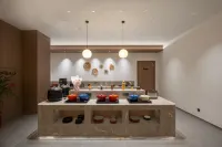 Miofon Hotel (East Bus Station And The City Light Branch）