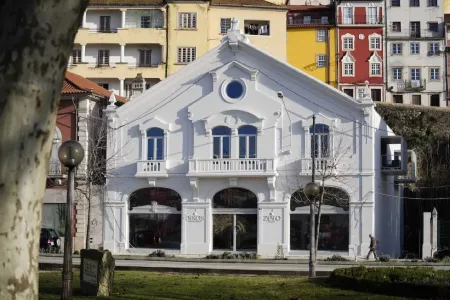 Zero Box Lodge Coimbra Отели рядом с достопримечательностью «Baroque Library - University of Coimbra»
