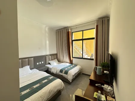 Shimian Anliangju Homestay Отели рядом с достопримечательностью «Caoke Tibetan Township»