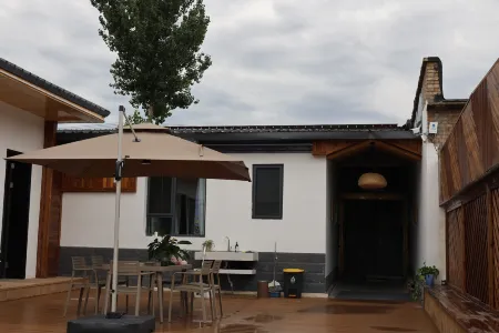 New Yuan County Court's homestay. Отели в г. Синьюань