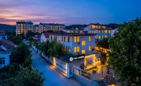 Floral Hotel·Guihai Lazy Cat Holiday Guesthouse (Putao Beach Location) - maisons de vacances