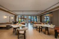 Yangxin Jinzhai Grand New Century Hotel - servizio colazione