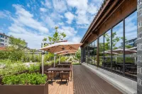 Liuchixiang Rezen Blossom Hotel - servizio colazione