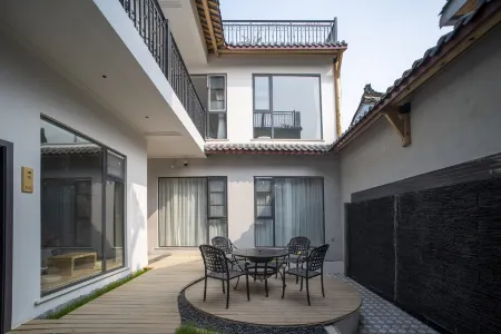 Baiyundu Light Luxury Meisu B&B Отели рядом с достопримечательностью «Pingle Ancient Town»