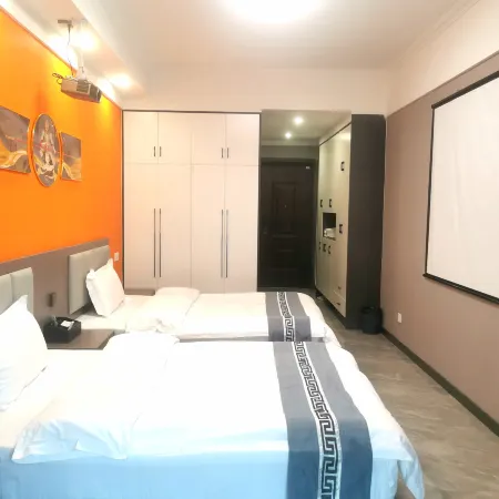 Elegant Residence Movie Homestay (Zhumadian West Station Jianye Triumph Plaza)