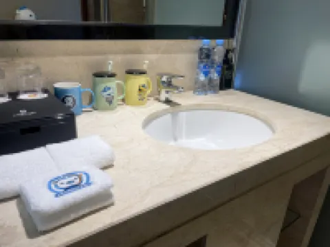 GreenTree Slow Trip Grand Hotel (Bayi Square First Affiliated Hospital) Отели в г. 