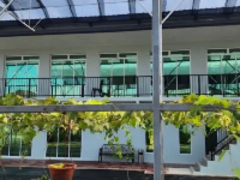 Grapevine Garden Hotels near Our Lady Queen Of Peace Catholic Church