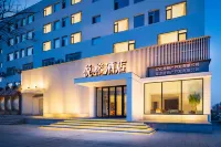 Yuerong Hotel (Liaoyang Liaohua Tesco) Hotel dekat Pengjia Residence