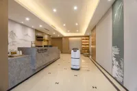 HuaJiYaShe Hotel (Huzhou Zhili Children's Clothing City) - parkir