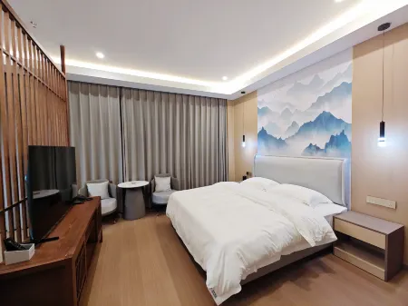 mingzhuhotel Отели рядом с достопримечательностью «Yinjiang Museum»