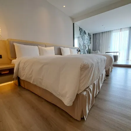 Boutech Wuri Village Hotel Отели рядом с достопримечательностью «Железнодорожная станция Синьужи»